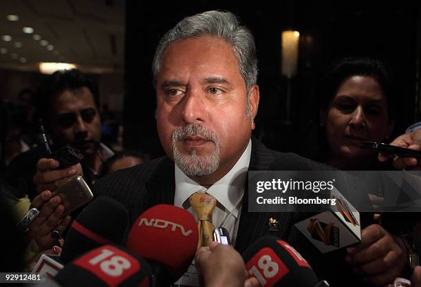 Vijay Mallya, chairman of United Spirits Ltd., speaks to the media at the World Economic Forum's India Economic Summit in New Delhi, India, on...