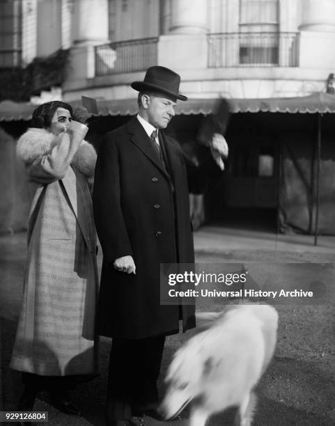 President Calvin Coolidge and First Lady Grace Coolidge viewing Solar Eclipse from White House Lawn, Washington DC, USA, Harris & Ewing, January 24,...