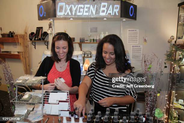 Two women shopping in Crystal Closet.