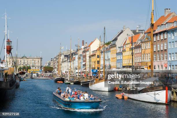 Copenhagen, Denmark, Typical architecture and boats at Nyhavn canal.