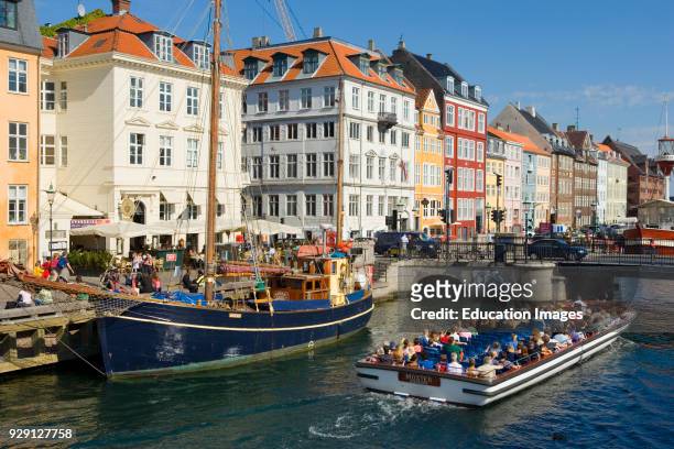 Copenhagen, Denmark, Typical architecture and boats at Nyhavn canal,.