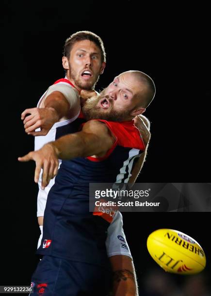 Max Gawn of the Demons and Tom Hickey of the Saints compete for the ball during the JLT Community Series AFL match between the Melbourne Demons and...