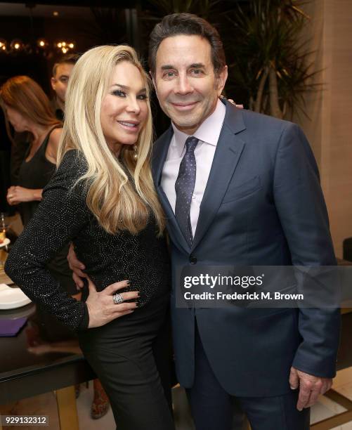 Adrienne Maloof, and Dr. Paul Nassif arrive for Dr. Paul Nassif unveils his new medical spa with grand opening and ribbon cutting ceremony on March...