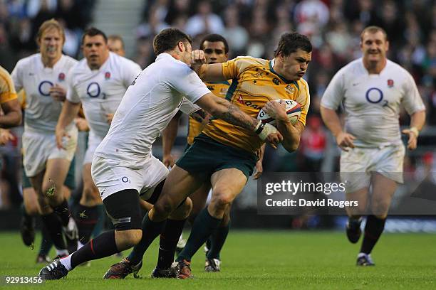 Adam Ashley-Cooper of Australia is tackled by Matt Banahan of England during the Investec Challenge Series match between England and Australia at...