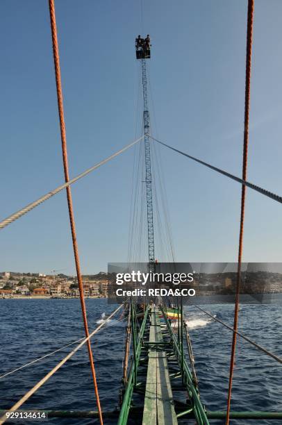 Traditional swordfish fishing. Fishingboat "Fulua". Fisherman. Stretto di Messina. Messina. Sicily. Italy. Europe.