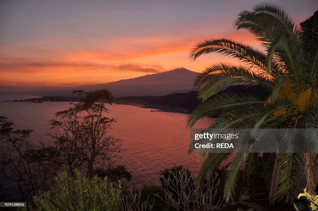 Giadini Naxos Harbor. Taormina sunset. Volcano Etna. Sicily. Italy. Europe