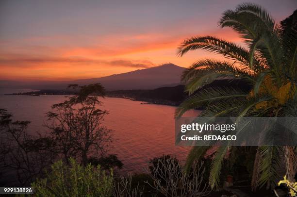 Giadini Naxos Harbor. Taormina sunset. Volcano Etna. Sicily. Italy. Europe.