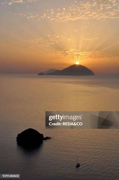 Filicudi Island and Alicudi Island view from Salina island. Sunset. Aeolian Island. Sicily. Italy. Europe.