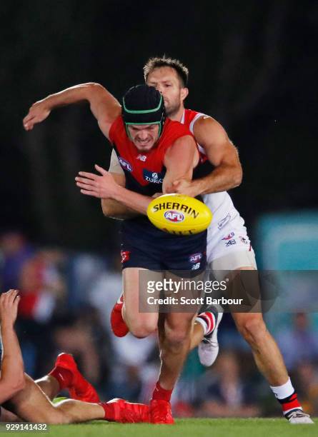 Angus Brayshaw of the Demons runs with the ball during the JLT Community Series AFL match between the Melbourne Demons and the St Kilda Saints at...