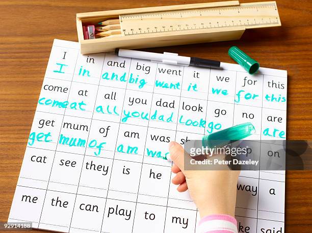 school child age 4-7 practicing handwriting. - parsons green stock pictures, royalty-free photos & images