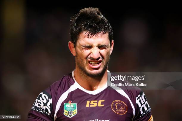 Matt Gillett of the Broncos grimaces as he leaves the field during the round one NRL match between the St George Illawarra Dragons and the Brisbane...