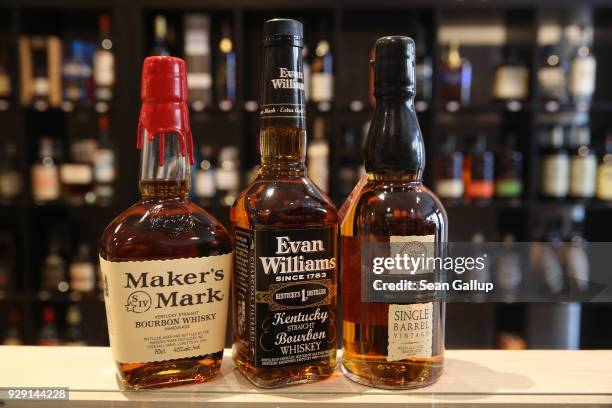 In this photo illustration bottles of American bourbon whiskey stand arranged at a whiskey shop on March 8, 2018 in Berlin, Germany. U.S. President...