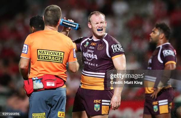 Matthew Lodge of the Broncos takes a drink during the round one NRL match between the St George Illawarra Dragons and the Brisbane Broncos at UOW...