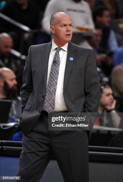 Head coach Tad Boyle of the Colorado Buffaloes looks on during a first-round game of the Pac-12 basketball tournament against the Arizona State Sun...