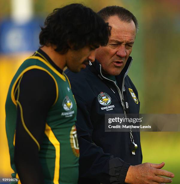 Tim Sheens, Coach of the VB Kangaroos Australian Rugby League Team, talks to Johnathan Thurston during a Training Session at Leeds Rugby Academy on...