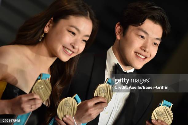 Maia Shibutani and Alex Shibutani attend the 2018 Vanity Fair Oscar Party hosted by Radhika Jones at Wallis Annenberg Center for the Performing Arts...