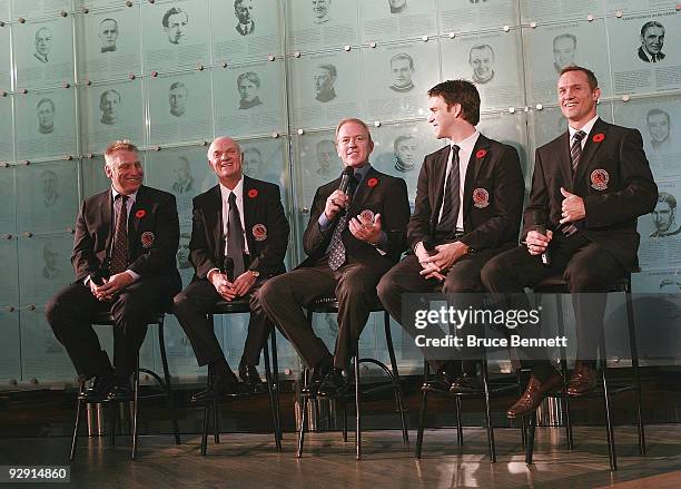 Brett Hull, Lou Lamoriello, Brian Leetch, Luc Robitaille, and Steve Yzerman speak with the media at the Hockey Hall of Fame Induction Photo...