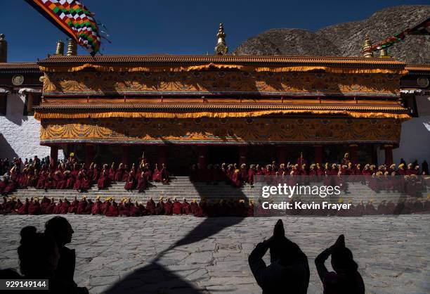 Tibetan Buddhist Monks of the Gelug or Yellow Hat school, chant prayers at the Labrang Monastery during Monlam or the Great Prayer, on March 2, 2018...