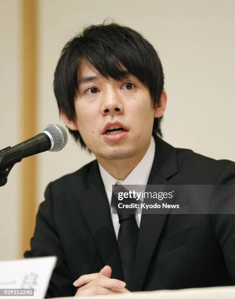 Coincheck Inc. CEO Koichiro Wada holds a press conference in Tokyo on March 8 to explain the company's plan to compensate its customers for the loss...