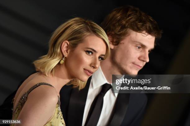 Actors Emma Roberts and Evan Peters attend the 2018 Vanity Fair Oscar Party hosted by Radhika Jones at Wallis Annenberg Center for the Performing...