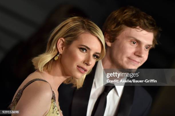 Actors Emma Roberts and Evan Peters attend the 2018 Vanity Fair Oscar Party hosted by Radhika Jones at Wallis Annenberg Center for the Performing...