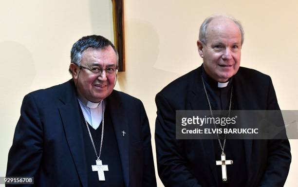Head of Catholic Church in Bosnia and Herzegovina, Cardinal Vinko Puljic and Archbishop of Vienna, Christoph Schonborn, arrive at a press conference,...