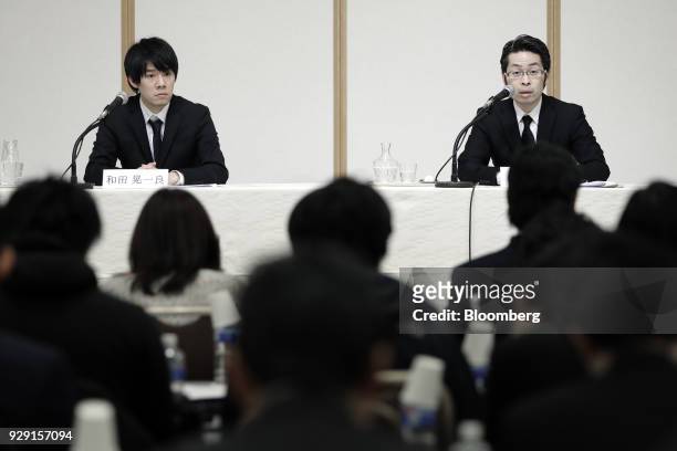 Yusuke Otsuka, chief operating officer of Coincheck Inc., right, speaks as Koichiro Wada, president of Coincheck Inc., looks on during a news...
