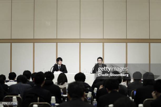 Yusuke Otsuka, chief operating officer of Coincheck Inc., right, speaks as Koichiro Wada, president of Coincheck Inc., looks on during a news...