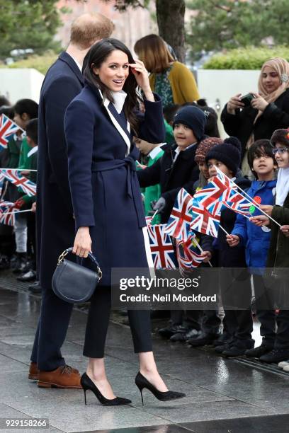 Prince Harry and Meghan Markle seen visiting Millenium Point on March 8, 2018 in Birmingham, England.