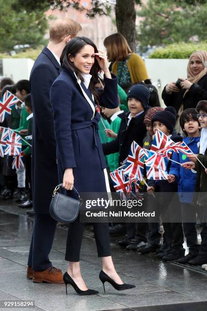 Prince Harry and Meghan Markle seen visiting Millenium Point on March 8, 2018 in Birmingham, England.