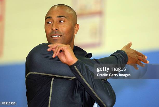 Colin Jackson OBE demonstrates some exercises in a Get Active workout at Morpeth School during the Launch of National School Meal Week on November 9,...