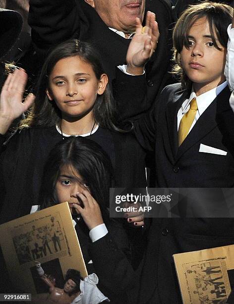 Michael Jackson's daughter Paris Michael Katherine Jackson and two sons Prince Michael Jackson II and Prince Michael Jackson I wave at the end of a...