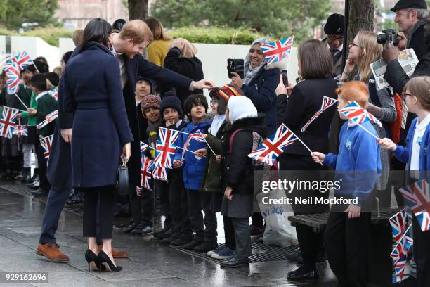 Prince Harry and Meghan Markle seen visiting Millenium Point on March 8, 2018 in Birmingham, England.