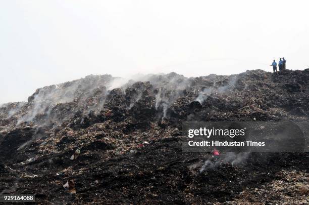 Major fire broke out at the Adharwadi dumping ground in Kalyan, on March 7, 2018 in Mumbai, India. Thick, black smoke continued to billow out of...