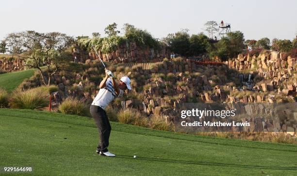 Emiliano Grillo of Argentina plays his second shot on the 17th hole during day one of the Hero Indian Open at Dlf Golf and Country Club on March 8,...