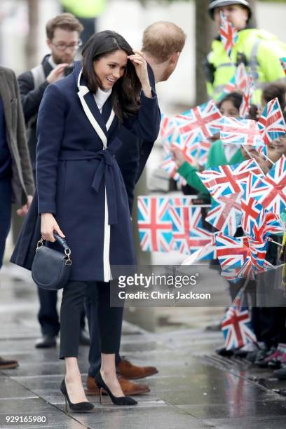 Prince Harry and Meghan Markle arrive to Birmingham on March 8, 2018 in Birmingham, England.