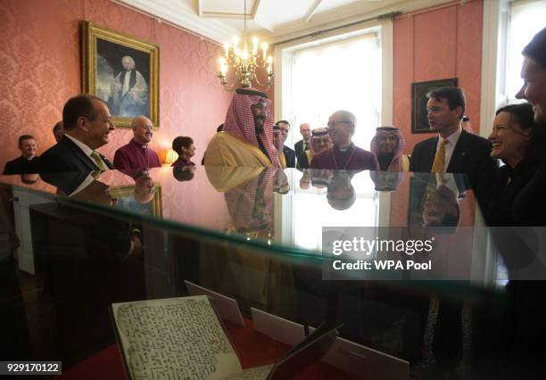 The Archbishop of Canterbury Justin Welby accompanies the Crown Prince of Saudi Arabia, HRH Mohammed bin Salman, as they view The Birmingham Qur'an...