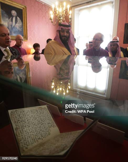 The Archbishop of Canterbury Justin Welby accompanies the Crown Prince of Saudi Arabia, HRH Mohammed bin Salman, as they view The Birmingham Qur'an...