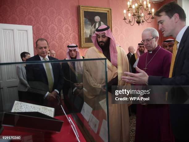 The Archbishop of Canterbury Justin Welby accompanies the Crown Prince of Saudi Arabia, HRH Mohammed bin Salman, as they view The Birmingham Qur'an...