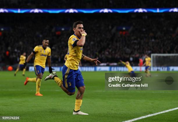 Paulo Dybala of Juventus celebrates after scoring his team's second goal during the UEFA Champions League Round of 16 Second Leg match between...