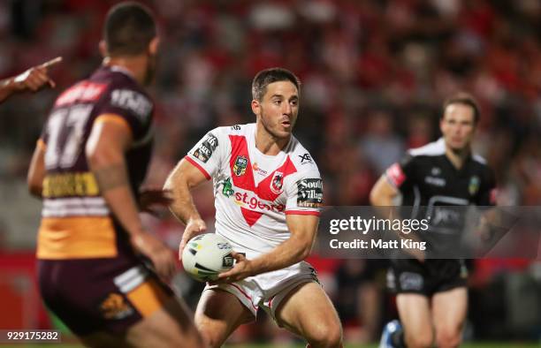 Ben Hunt of the Dragons runs with the ball during the round one NRL match between the St George Illawarra Dragons and the Brisbane Broncos at UOW...