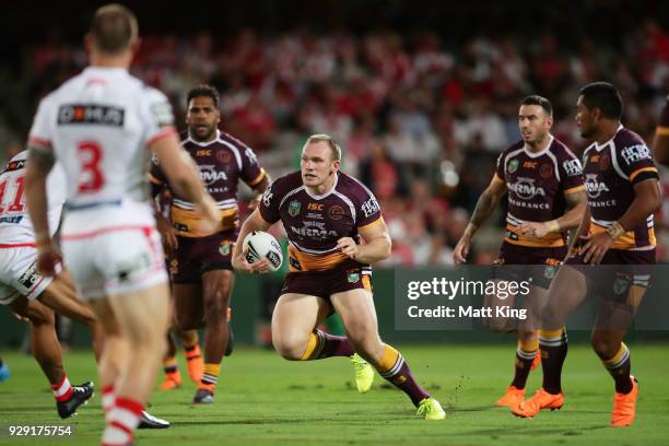 Matthew Lodge of the Broncos runs with the ball during the round one NRL match between the St George Illawarra Dragons and the Brisbane Broncos at...