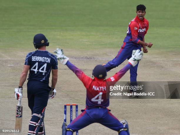 Sandeep Lamichhane of Nepal celebrates taking the wicket of Richie Berrington of Scotland during the ICC Cricket World Cup Qualifier between Scotland...
