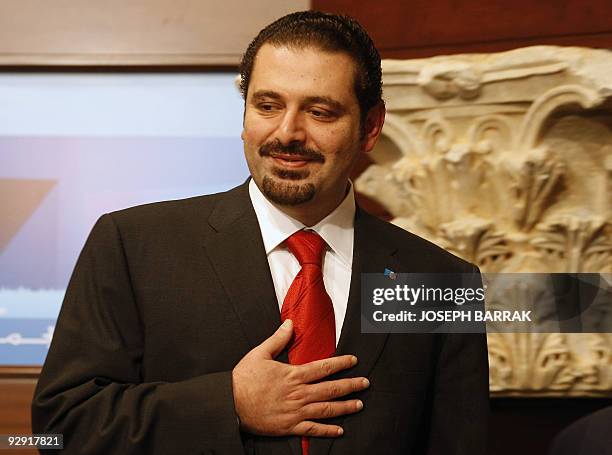 Lebanon's new Prime Minister Saad Hariri gestures during a press conference at the presidential palace in Baabda, east of Beirut, on November 9,...