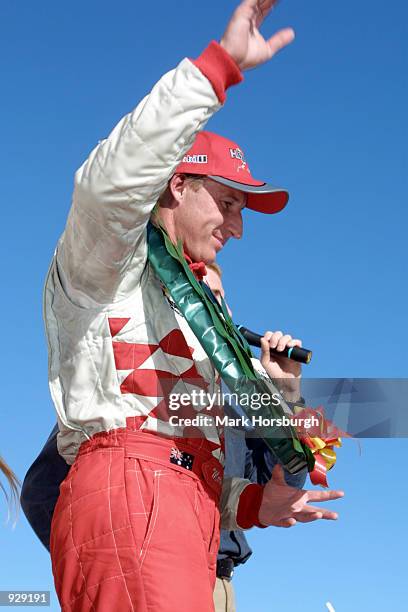 Mark Skaife of the Holden Racing Team acknowledges his win after race two of Round One of the Shell Championship Series, at the Phillip Island...