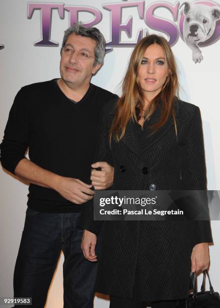 Actors Alain Chabat and Mathilde Seigner pose as they attend the premiere of the directors Claude Berry and Francois Dupeyron's film "Tresor" at...