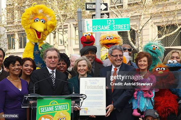 Company CEO George Fertitta, Sesame Street founder and TV producer Joan Ganz Cooney and Sesame Workshop president and CEO Gary E. Knell hold the New...