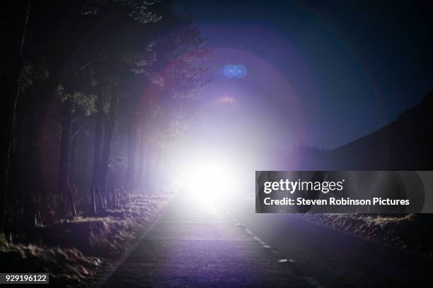 car approaching - headlamp stock pictures, royalty-free photos & images