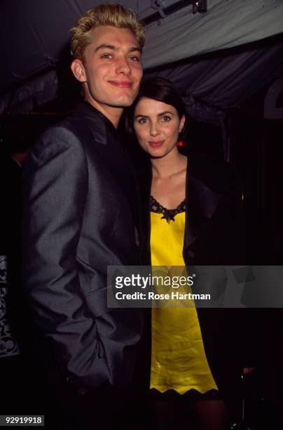 Portrait of British actor Jude Law and his girlfriend , actress and fashion designer Sadie Frost, as they attend the opening night party at Tavern on...