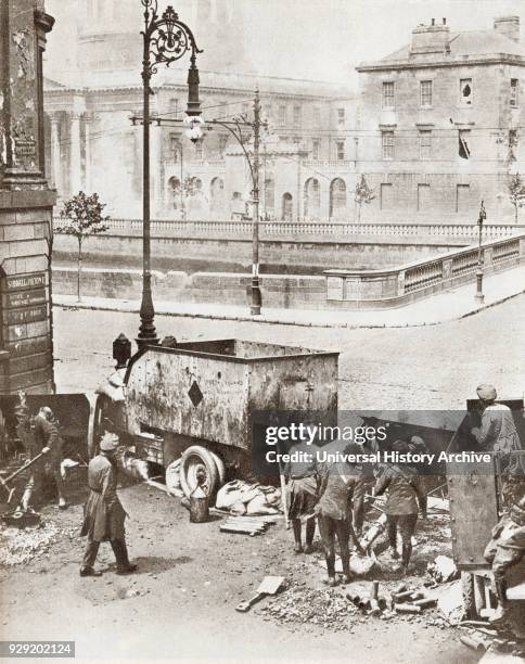 Scene at the Four Courts, Dublin, Ireland during the battle for their possession at the start of the Irish Civil War in 1922. From The Story of 25...